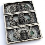Esculturas feitas a laser em notas de dólar