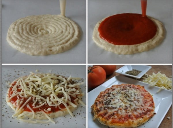 Uma pizza de mozarela sendo produzida com a impressora 3D desenvolvida na Espanha.